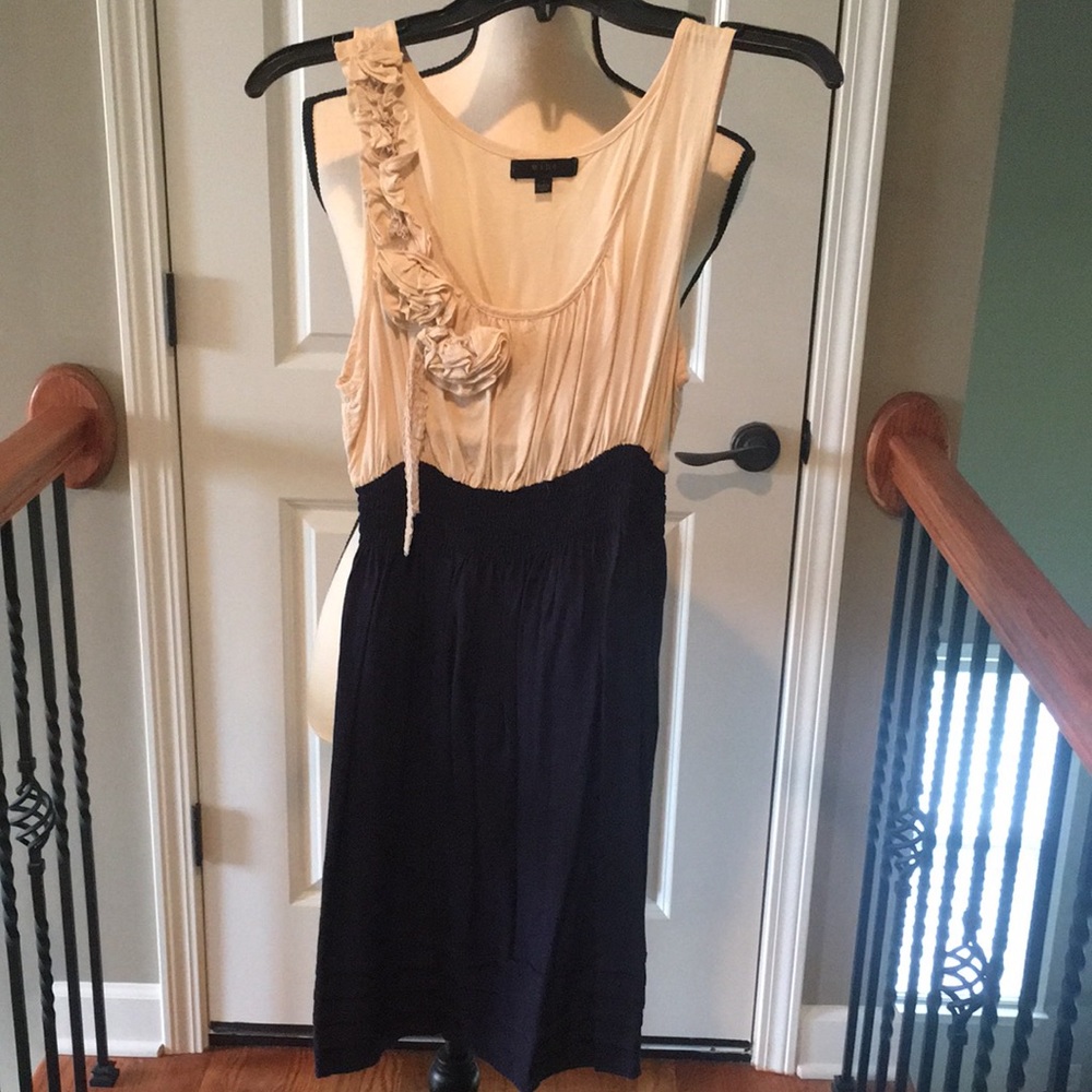 Sleeveless navy and cream dress